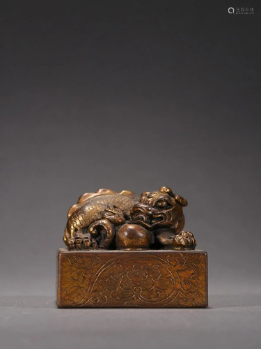 A Delicate Gilt-bronze Beast Seal