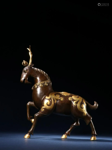 A Gilt-bronze Beast Ornament