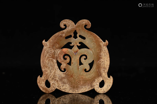 A Carved Jade Pendant