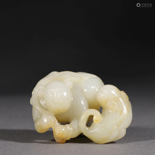 A White Jade Carved Boy Pendant