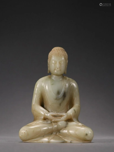 A Rare Jade Carved Figure of Shakyamuni
