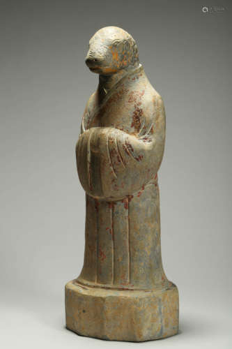 Carved Limestone Figure of Attendant