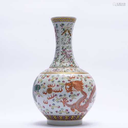 An allite red glazed 'dragon and phoenix' vase