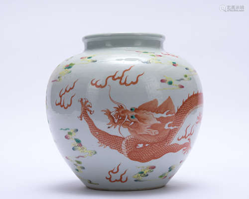 An allite red glazed 'dragon' jar