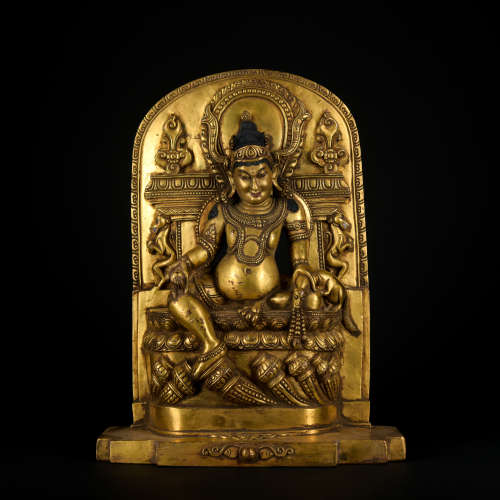 A gilt-bronze statue of Mammon