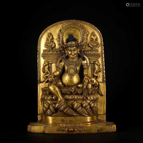 A gilt-bronze statue of Mammon