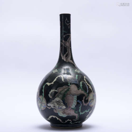 A black ground Wu cai 'lion' vase