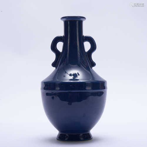 A blue glazed vase