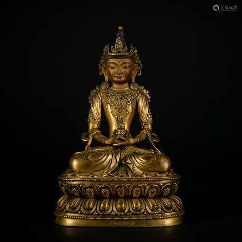 A gilt-bronze statue of Amitayus