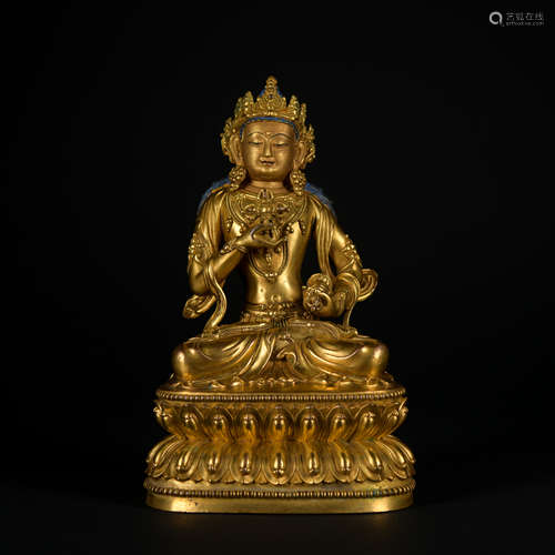 A gilt-bronze statue of Vajrapani