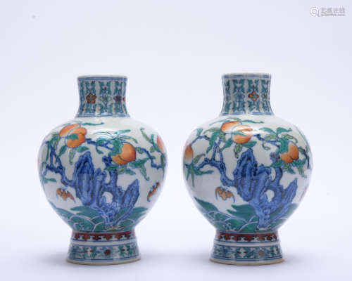 A pair of Dou cai 'beast' vase
