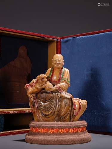 A Field-yellowstone  'Arhat Plays with Beast' Statue