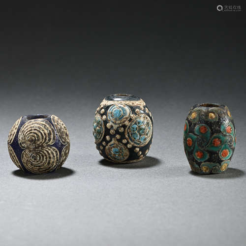 A SET OF DRAGONFLY EYE GLASS BEADS IN THE WAR AND HAN DYNAST...