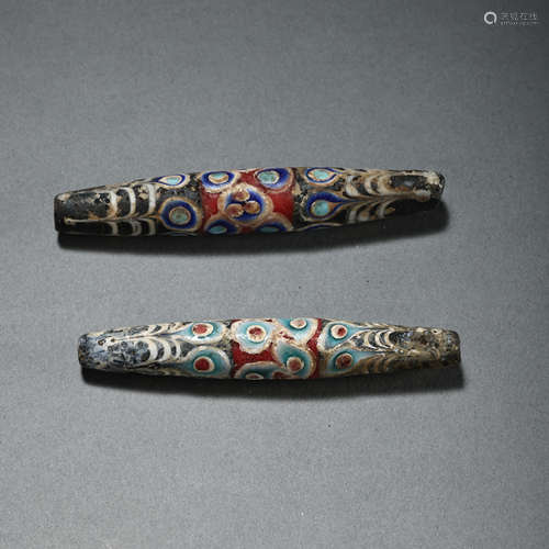 A PAIR OF CHINESE DRAGONFLY EYE GLASS BEADS