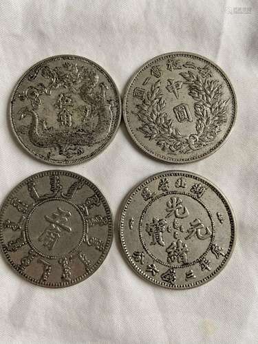 Four Chinese coins