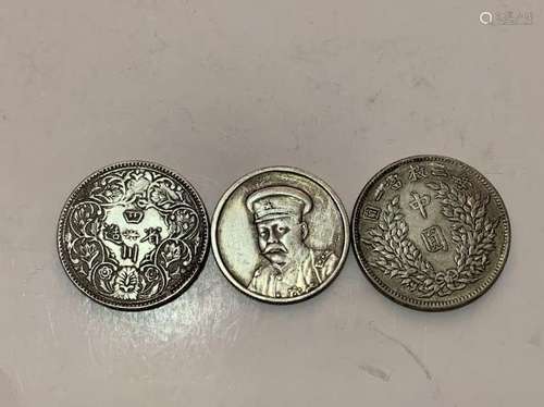 Three Chinese Coins