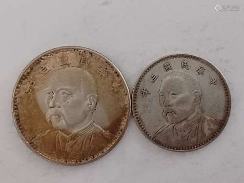 TWO CHINESE OLD SILVER COINS