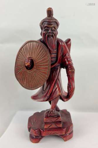 Hand carved redwood Chinese man with shield