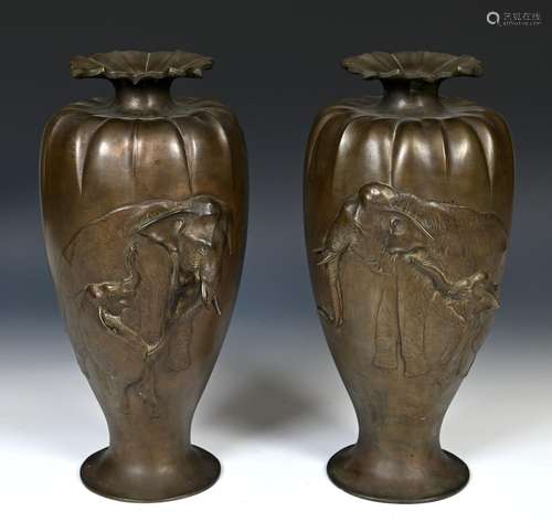 A large pair of Japanese bronze vases, of lobed baluster for...