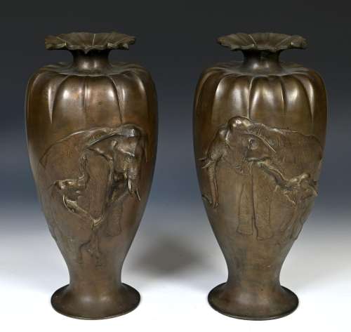 A large pair of Japanese bronze vases, of lobed baluster for...