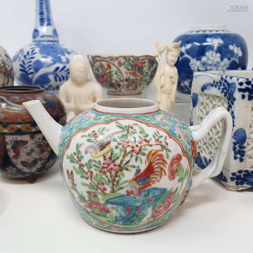 A Chinese famille rose teapot, decorated birds and foliage, ...