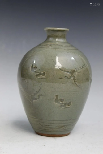 Korean Celadon Pottery Vase with Carved Crane Decorations.