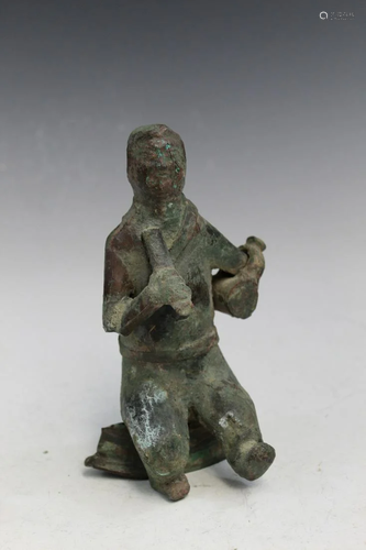 Metal Figure of a Musician