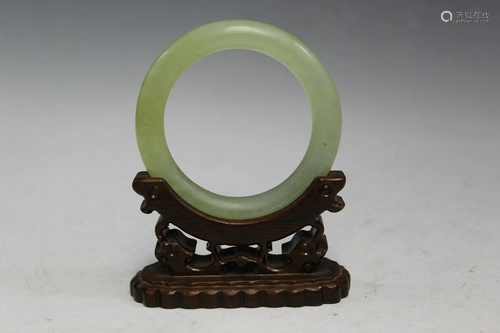 Chinese Jade Bangle on Wood Stand