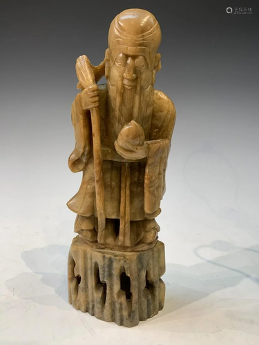 Soapstone carving of an old man