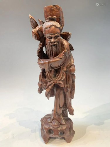 Chinese wood carving of a figure