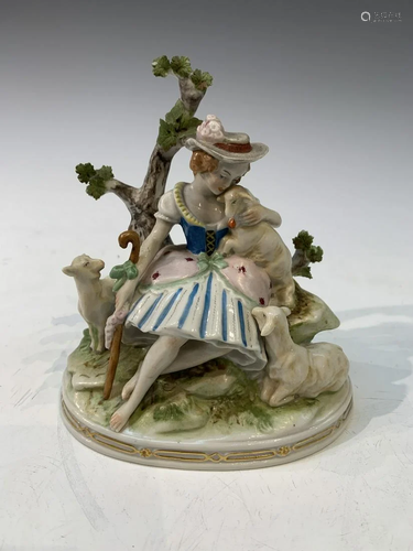 Sitzendorf porcelain figure of a sheperdess with lambs