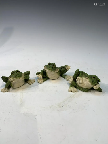 Set of three resin painted frogs