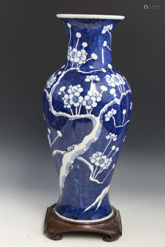 Blue and White Porcelain Vase on Wood Stand