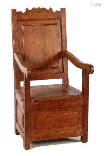 Oak armchair with storage space under seat, 19th century
