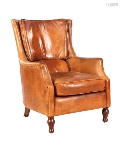 Brown leather arm chair on walnut legs