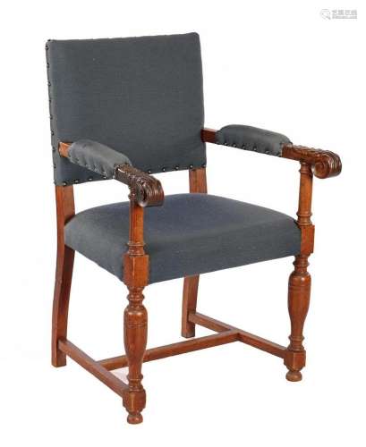 Oak armchair with blue upholstery and carved decor