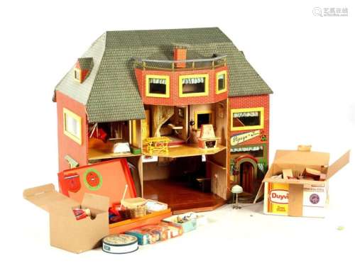 Old dollhouse with accessories