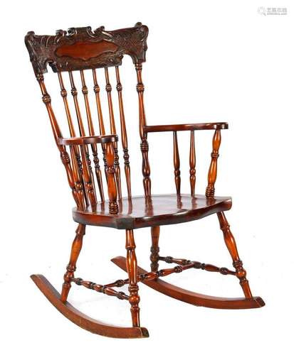 Cherry color wooden rocking chair with bars