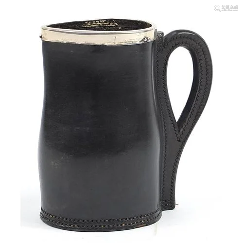 Early 20th century leather Black Jack jug with silver rim, i...