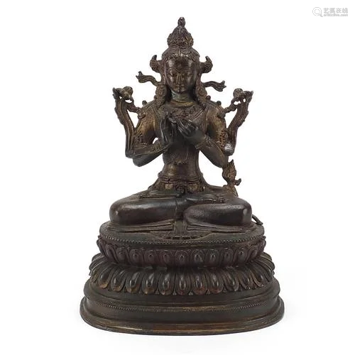 Chino Tibetan patinated bronze figure of seated Buddha, 35cm...