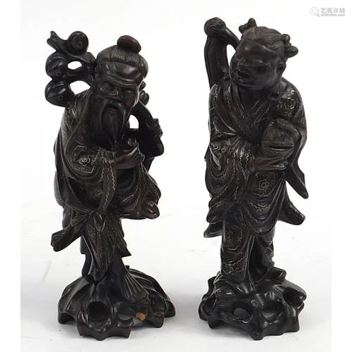 Pair of Chinese carved root wood figures with white metal in...