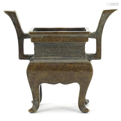 Chinese patinated bronze censer with twin handles, 15cm high
