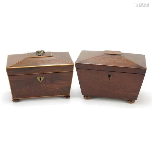 Two Victorian mahogany sarcophagus shaped tea caddies with t...