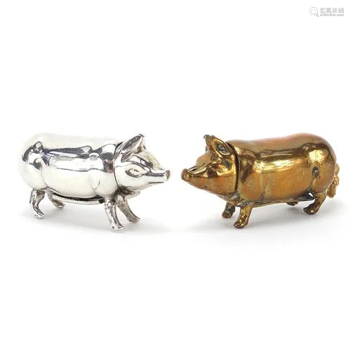 Two Victorian pig vesta cases including a brass example, eac...