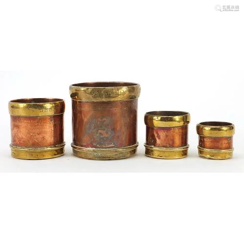 Graduated set of four 19th century copper and brass grain me...