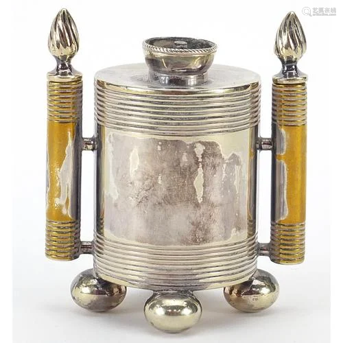 Silver plated table lighter raised on four bun feet, 8cm hig...