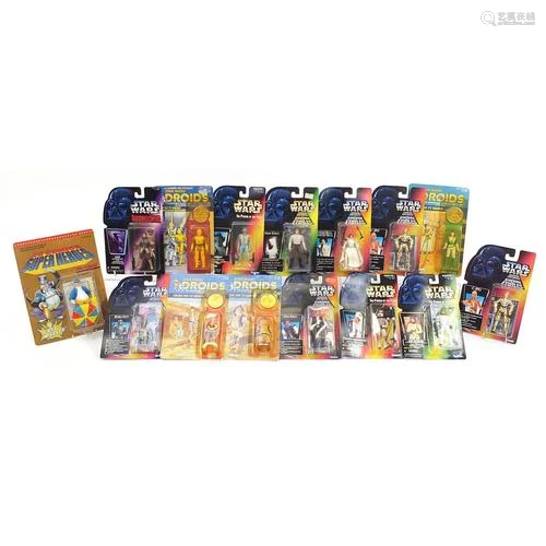 Star Wars and D C Comics action figures housed in sealed bli...