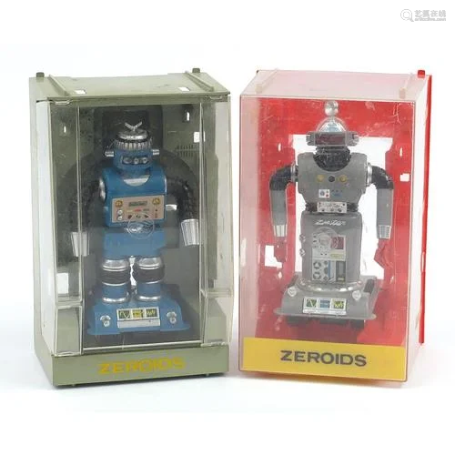 Two vintage Zeroids robots with cases, the largest box 21.5c...