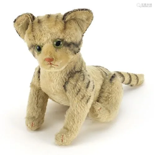 Vintage soft toy tiger with articulated limbs, probably Stef...