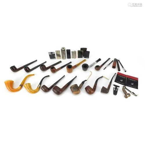 Vintage smoking pipes and lighters including Falcon and Zipp...